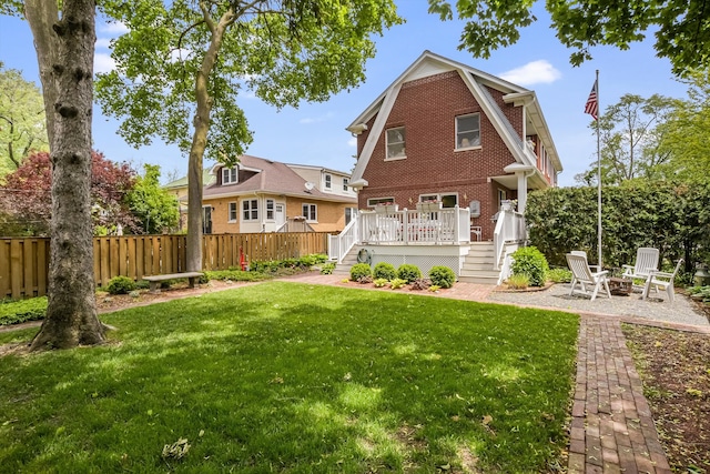 718 S Washington Ave, Park Ridge, IL 60068 - rear view of property featuring brick siding, a wooden deck, stairs, and a patio area