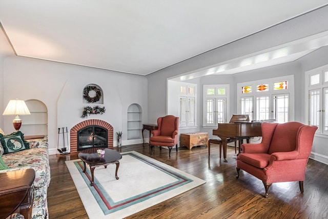 718 S Washington Ave, Park Ridge, IL 60068 - living area with built in features, a fireplace, and dark wood finished floors