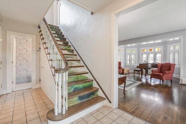 718 S Washington Ave, Park Ridge, IL 60068 - staircase with tile patterned flooring and crown molding