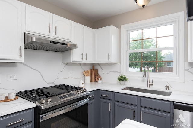 8619 Koehler Dr, Tinley Park, IL 60487 - kitchen with stainless steel appliances, under cabinet range hood, gray cabinets, and white cabinetry
