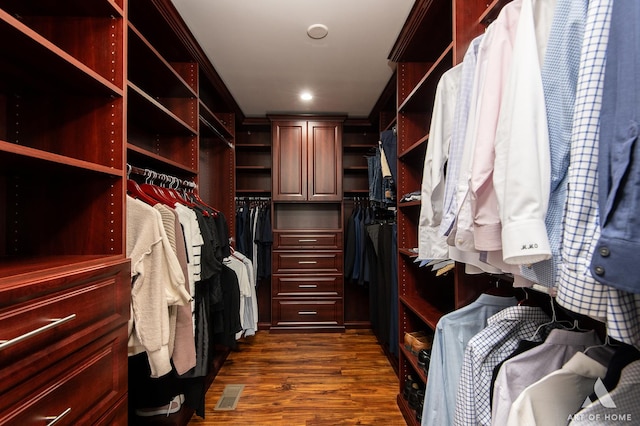 8619 Koehler Dr, Tinley Park, IL 60487 - walk in closet featuring dark wood-type flooring