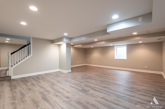 8619 Koehler Dr, Tinley Park, IL 60487 - basement with wood finished floors, recessed lighting, and stairway