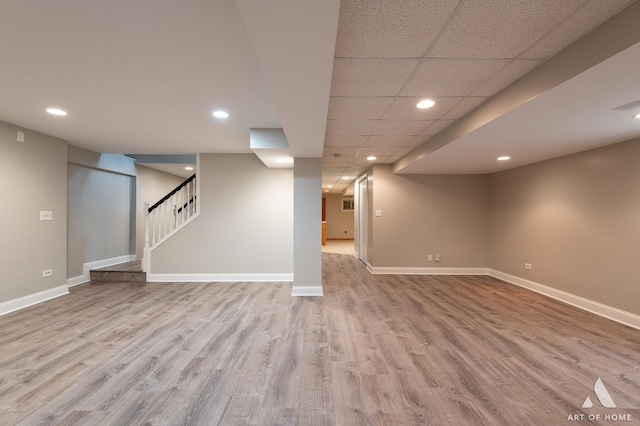 8619 Koehler Dr, Tinley Park, IL 60487 - finished below grade area with wood finished floors, recessed lighting, and stairs