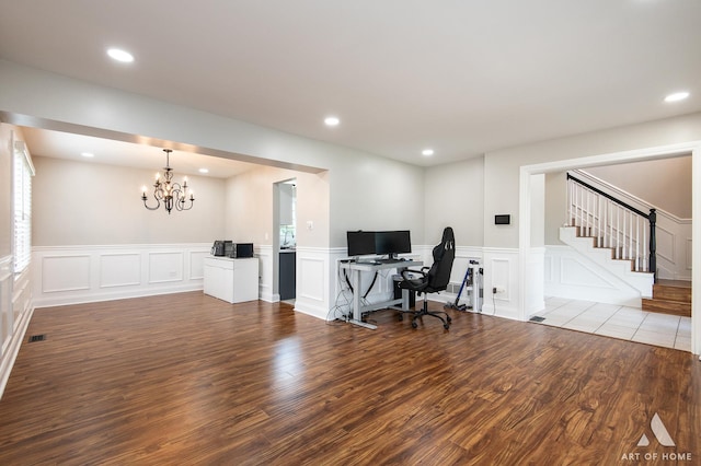 8619 Koehler Dr, Tinley Park, IL 60487 - office with wood finished floors, a decorative wall, a chandelier, a wainscoted wall, and recessed lighting