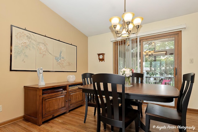 3406 W Bretons Dr, Mchenry, IL 60050 - dining room with a chandelier and light wood-style flooring