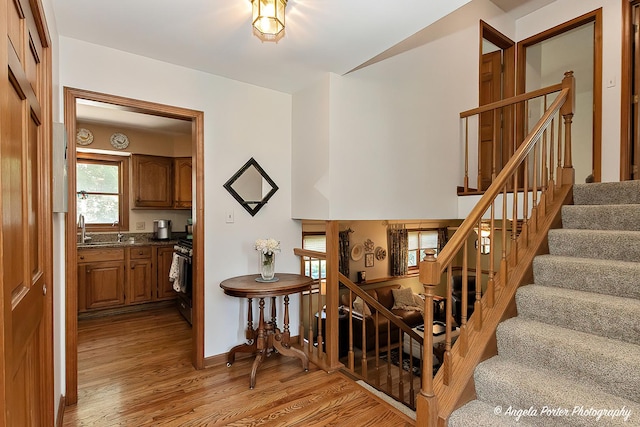 3406 W Bretons Dr, Mchenry, IL 60050 - stairway featuring wood finished floors and baseboards
