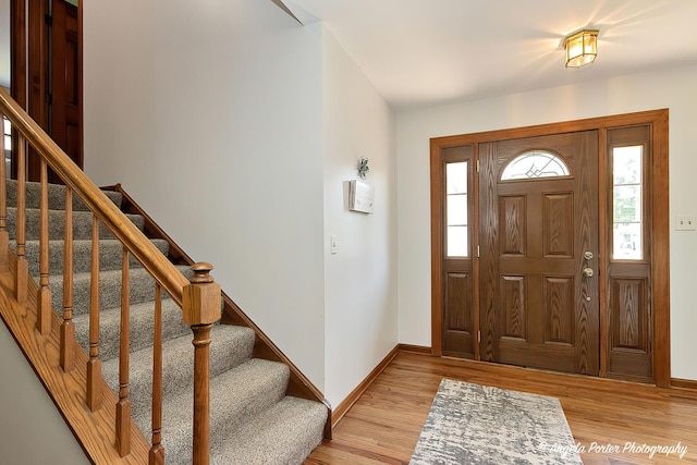 3406 W Bretons Dr, Mchenry, IL 60050 - entrance foyer with light wood-type flooring and stairs