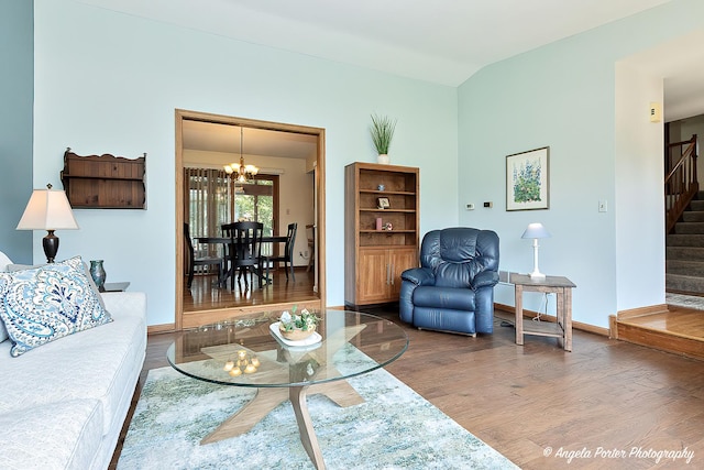 3406 W Bretons Dr, Mchenry, IL 60050 - living room with stairway, wood finished floors, and a chandelier