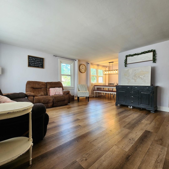 700 W Lafayette St, Ottawa, IL 61350 - living room with dark wood finished floors and a chandelier