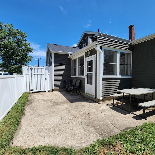700 W Lafayette St, Ottawa, IL 61350 - back of property featuring a patio and a gate