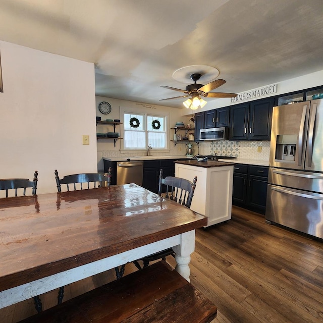 700 W Lafayette St, Ottawa, IL 61350 - dining space featuring a ceiling fan and dark wood-style flooring