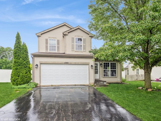 11880 Everglades Rd, Huntley, IL 60142 - traditional home with driveway and an attached garage