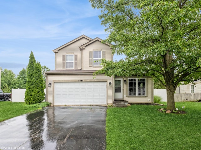 11880 Everglades Rd, Huntley, IL 60142 - traditional-style home with driveway and an attached garage