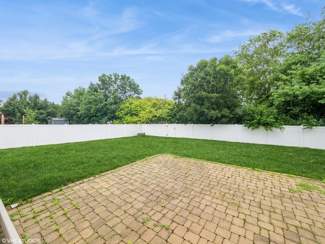 11880 Everglades Rd, Huntley, IL 60142 - fenced backyard with a patio