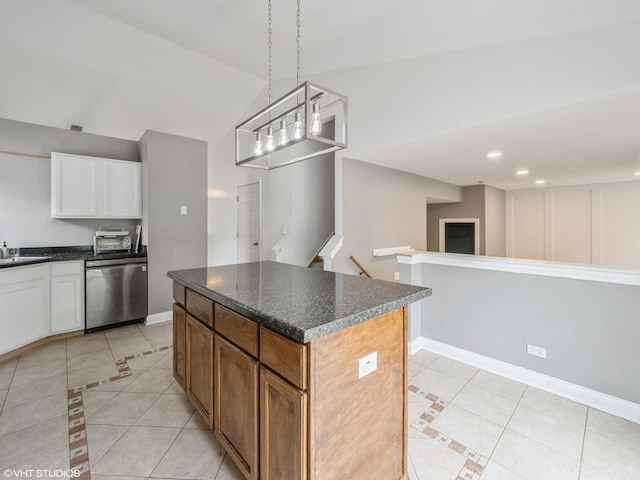 11880 Everglades Rd, Huntley, IL 60142 - kitchen with stainless steel dishwasher, light tile patterned floors, inlaid floor details, dark countertops, and lofted ceiling