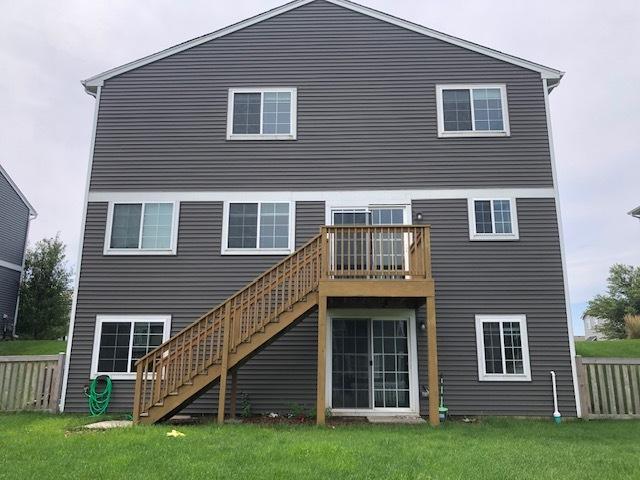 900 Heartland Park Ln, Antioch, IL 60002 - rear view of house featuring stairway