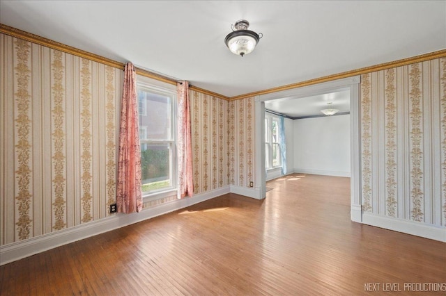 12 N Lincolnway Ave, North Aurora, IL 60542 - empty room featuring wood-type flooring and crown molding