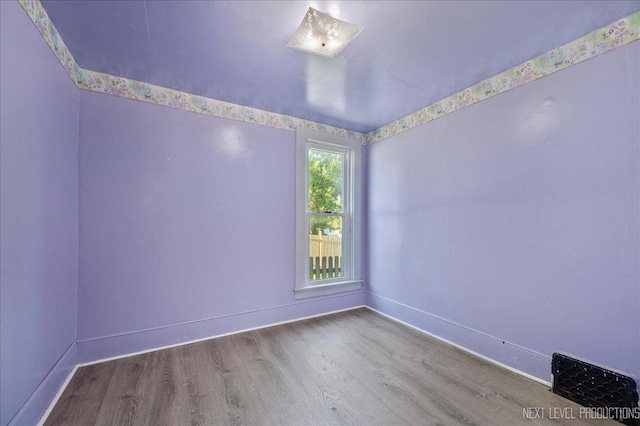 12 N Lincolnway Ave, North Aurora, IL 60542 - empty room featuring wood finished floors
