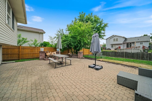 2113 Lolo Pass Dr, Plainfield, IL 60586 - fenced backyard featuring a patio and outdoor dining area