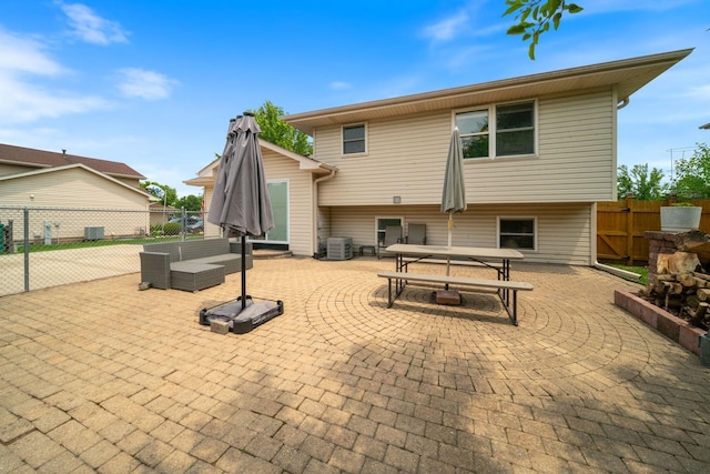 2113 Lolo Pass Dr, Plainfield, IL 60586 - back of house featuring a patio and outdoor dining space