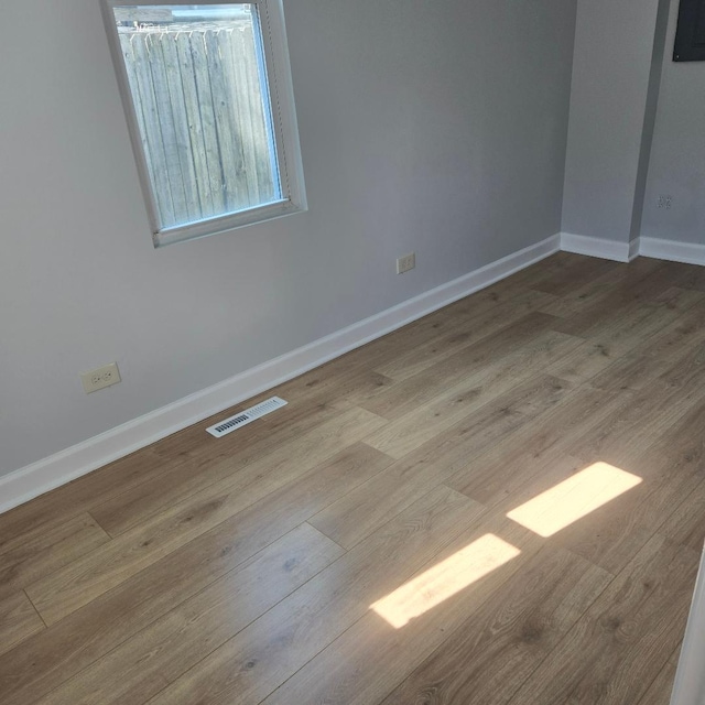 210 Brierhill Dr, Round Lake Park, IL 60073 - unfurnished room featuring wood finished floors and baseboards