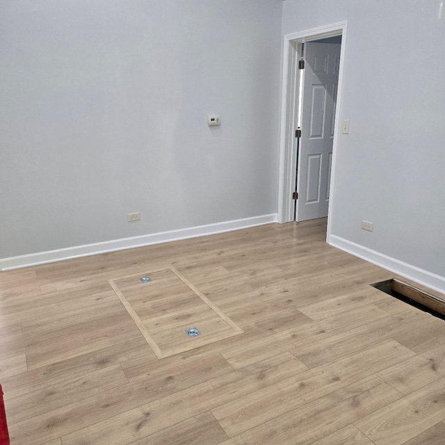 210 Brierhill Dr, Round Lake Park, IL 60073 - empty room featuring light wood-style flooring and baseboards