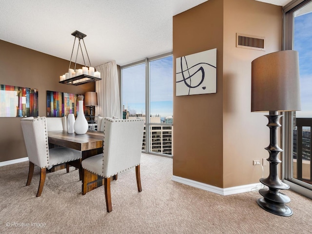 222 N Columbus Dr Unit 4803, Chicago, IL 60601 - dining room with a wall of windows, carpet flooring, and a chandelier