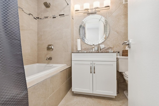 601 E 32nd St Unit 1002, Chicago, IL 60616 - bathroom with tiled shower / bath combo, tile walls, and vanity