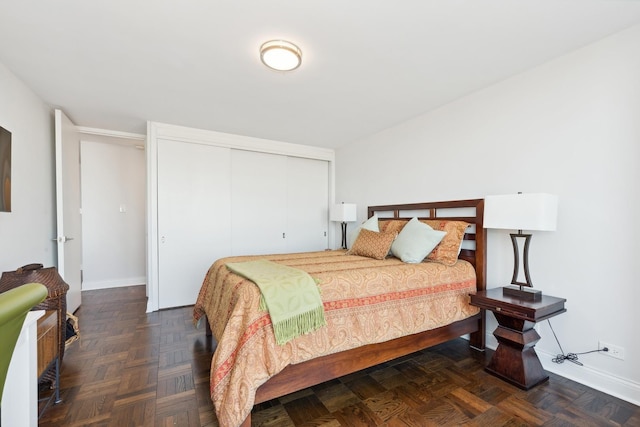 601 E 32nd St Unit 1002, Chicago, IL 60616 - bedroom with baseboards and a closet
