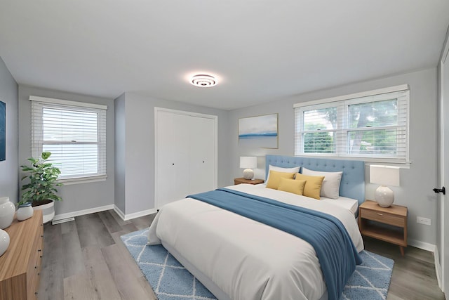 257 N Grace St, Lombard, IL 60148 - bedroom with baseboards and wood finished floors