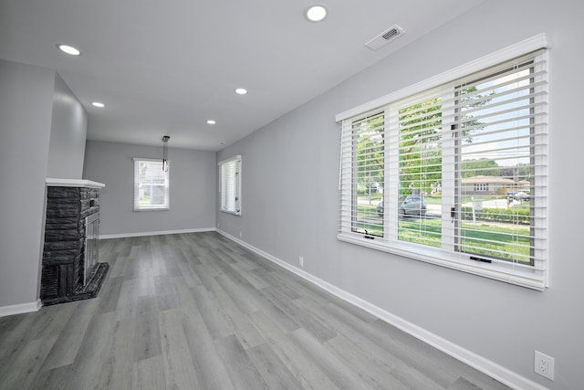 257 N Grace St, Lombard, IL 60148 - unfurnished living room with recessed lighting, wood finished floors, and a fireplace