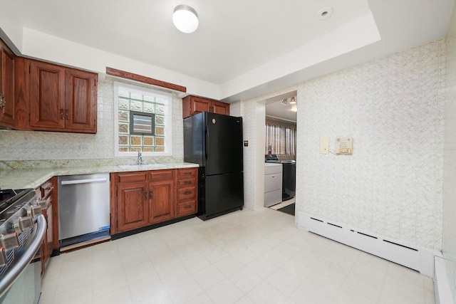 3901 N Neva Ave, Chicago, IL 60634 - kitchen with appliances with stainless steel finishes, a baseboard radiator, light floors, and light stone counters