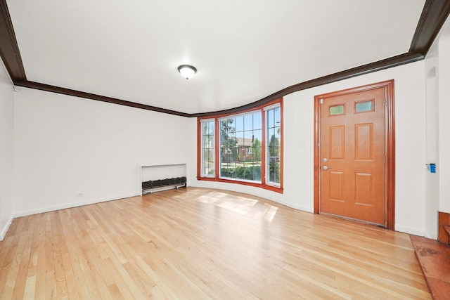 3901 N Neva Ave, Chicago, IL 60634 - unfurnished living room featuring light wood-style flooring and crown molding