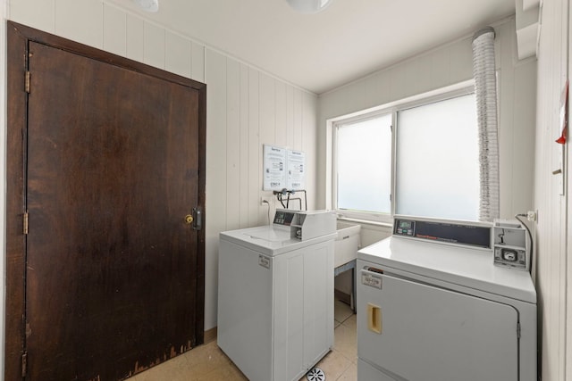 119 Boardwalk St Unit 1W, Elk Grove Village, IL 60007 - communal laundry room with washing machine and dryer and light tile patterned floors