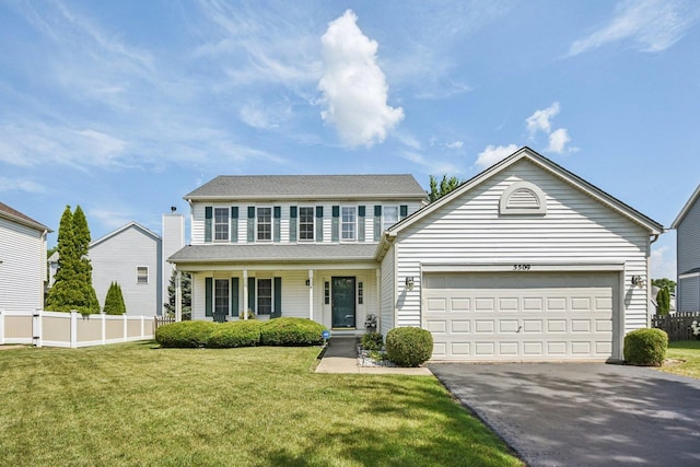 5509 Hickory Grove Ct, Plainfield, IL 60586 - view of front facade with asphalt driveway, a porch, and an attached garage