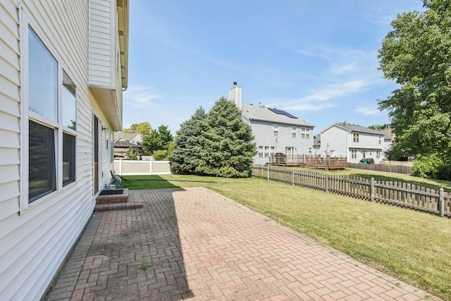 5509 Hickory Grove Ct, Plainfield, IL 60586 - fenced backyard with a patio and a residential view