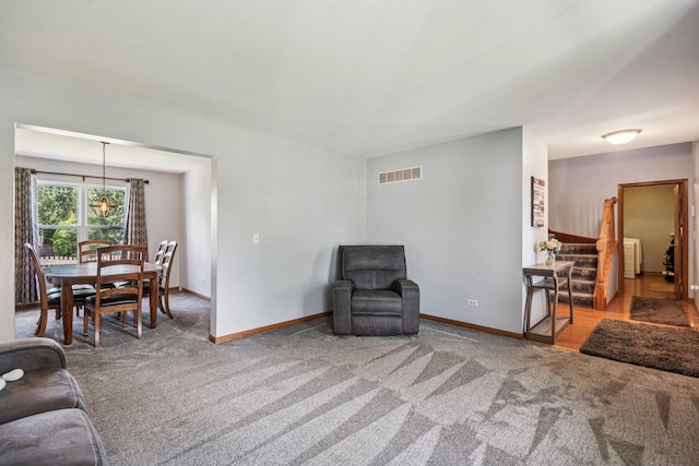 5509 Hickory Grove Ct, Plainfield, IL 60586 - living area featuring carpet and a chandelier