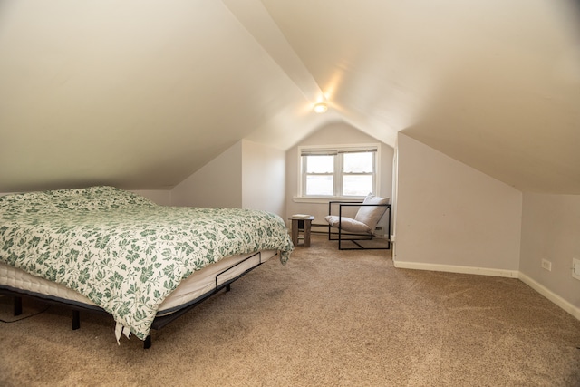 2815 W Fitch Ave, Chicago, IL 60645 - carpeted bedroom with lofted ceiling and baseboards