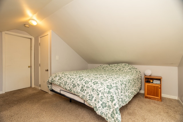 2815 W Fitch Ave, Chicago, IL 60645 - bedroom featuring light colored carpet and vaulted ceiling