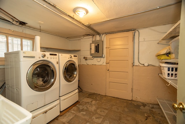 2815 W Fitch Ave, Chicago, IL 60645 - laundry area featuring electric panel and washer and dryer