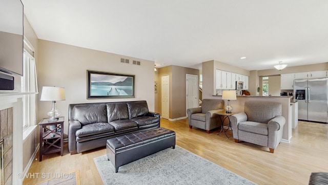 654 Linden Dr, Carol Stream, IL 60188 - living room with light wood-style floors