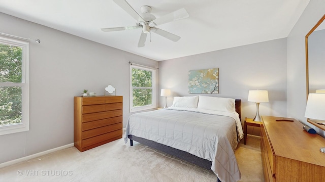 654 Linden Dr, Carol Stream, IL 60188 - bedroom with light colored carpet and ceiling fan