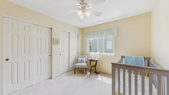 654 Linden Dr, Carol Stream, IL 60188 - bedroom featuring multiple closets, carpet floors, and ceiling fan