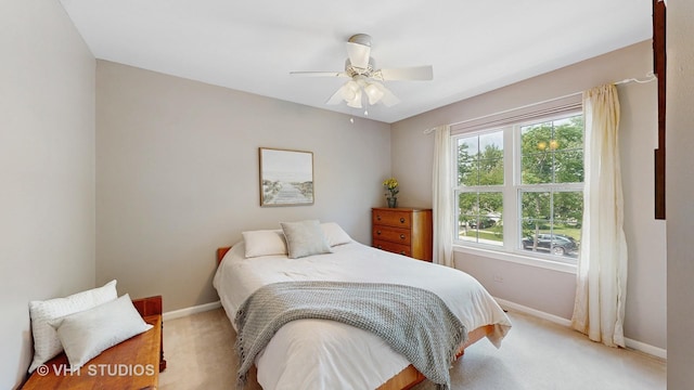 654 Linden Dr, Carol Stream, IL 60188 - bedroom with light colored carpet and a ceiling fan