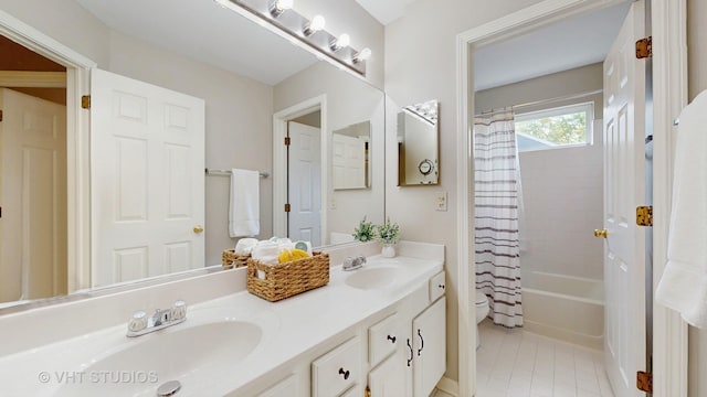 654 Linden Dr, Carol Stream, IL 60188 - full bathroom featuring double vanity, shower / bathtub combination with curtain, and tile patterned floors