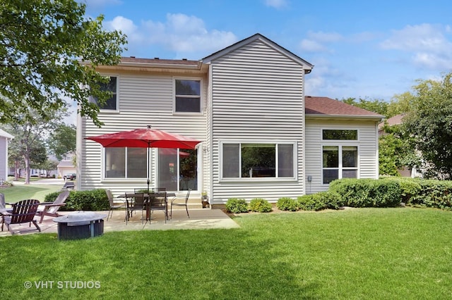 654 Linden Dr, Carol Stream, IL 60188 - rear view of house featuring a lawn, a patio area, and a shingled roof