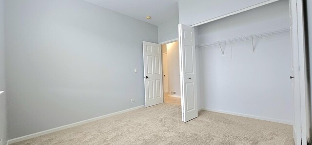 1793 Lanyon Dr, Bartlett, IL 60103 - unfurnished bedroom with a closet and light colored carpet