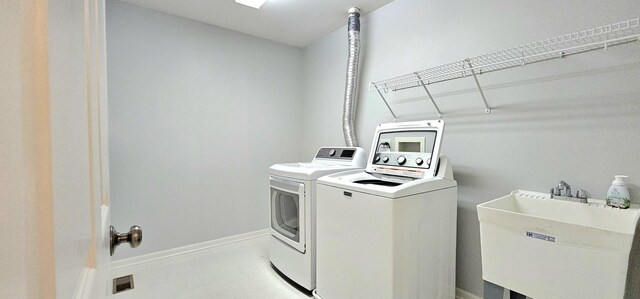 1793 Lanyon Dr, Bartlett, IL 60103 - laundry area featuring washer and dryer and baseboards