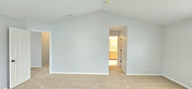 1793 Lanyon Dr, Bartlett, IL 60103 - unfurnished bedroom with vaulted ceiling and light colored carpet