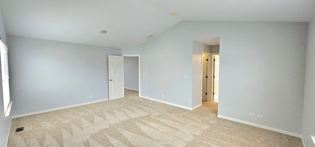 1793 Lanyon Dr, Bartlett, IL 60103 - unfurnished bedroom featuring vaulted ceiling and light carpet